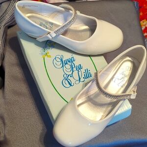 Little girls white patent leather shoes